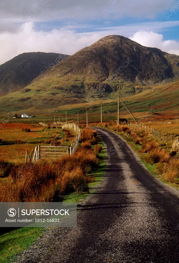 Maumturk Mountains, Connemara, County Galway, Ireland; Country Road