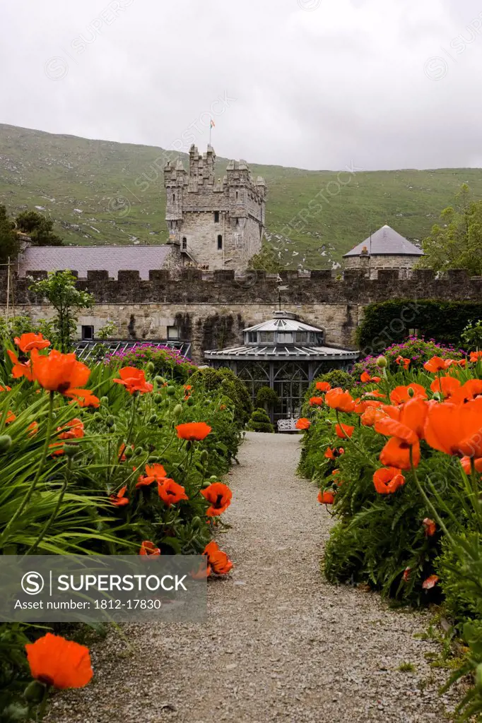 Glenveagh National Park, County Donegal, Ireland; Flowering Irish Garden With Castle In Background