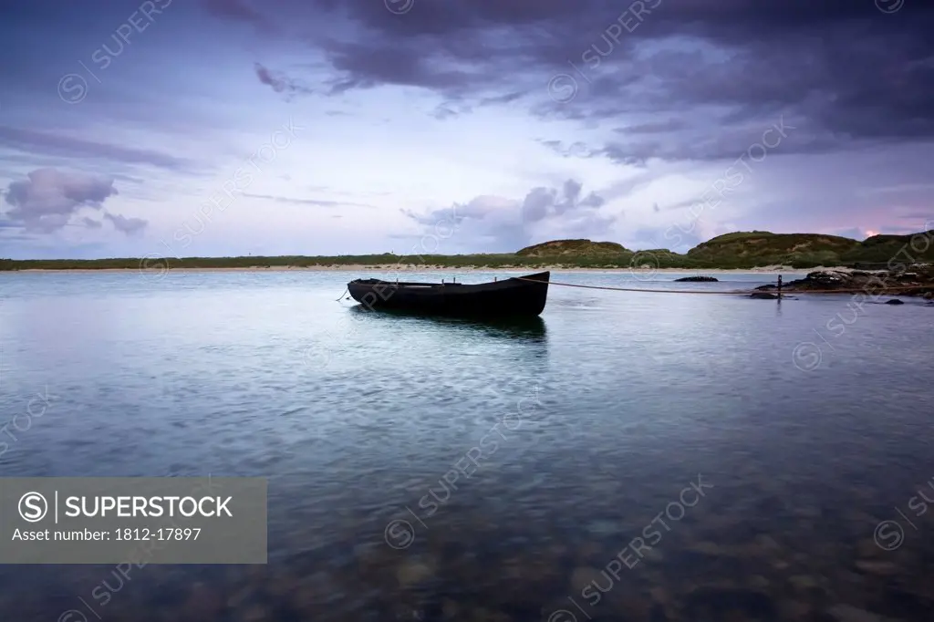 Dogs Bay, Roundstone, County Galway, Ireland; Fishing Boat In Water At Twilight