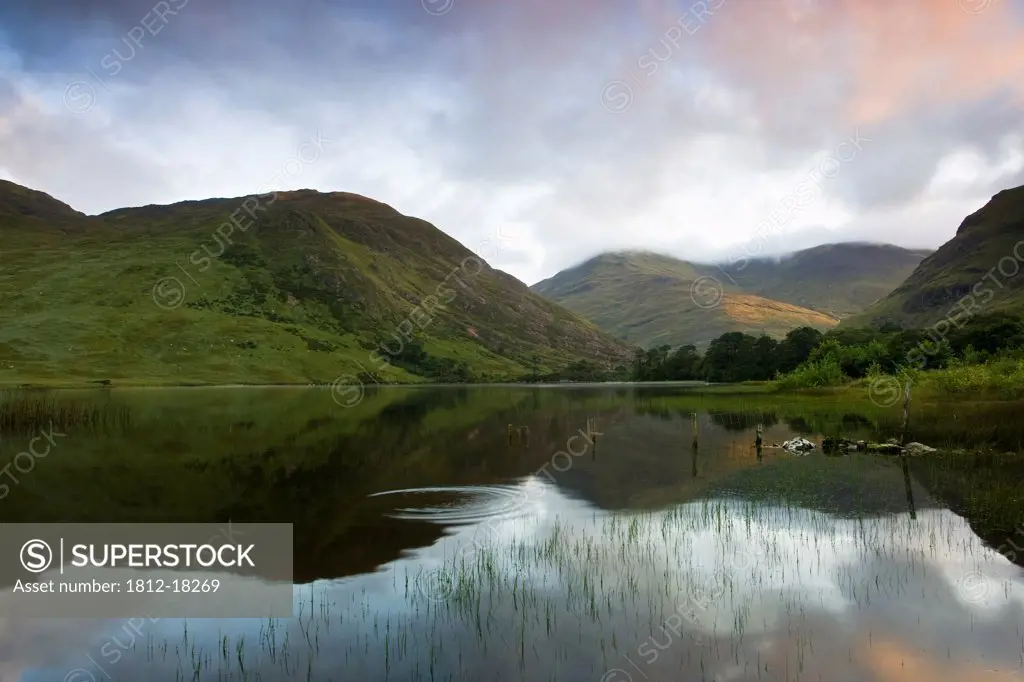 Fin Lough, Delphi Valley, Co Galway, Ireland; Mweelrea And The Sheeffry Hills Reflected In The Lake At Sunrise