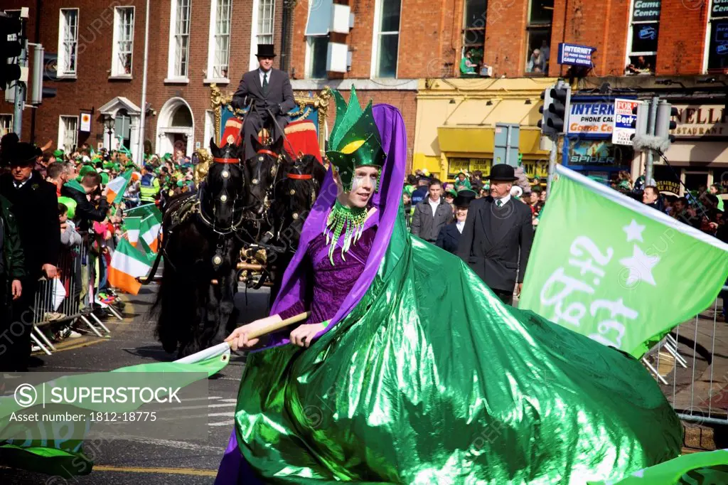 Dublin, Ireland; A Woman Dressed Up In A Costume For A Parade On O'connell Street