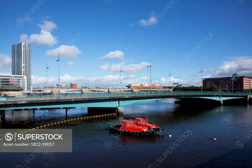 A Boat And Bridge Over River Lagan; Belfast, County Antrim, Ireland