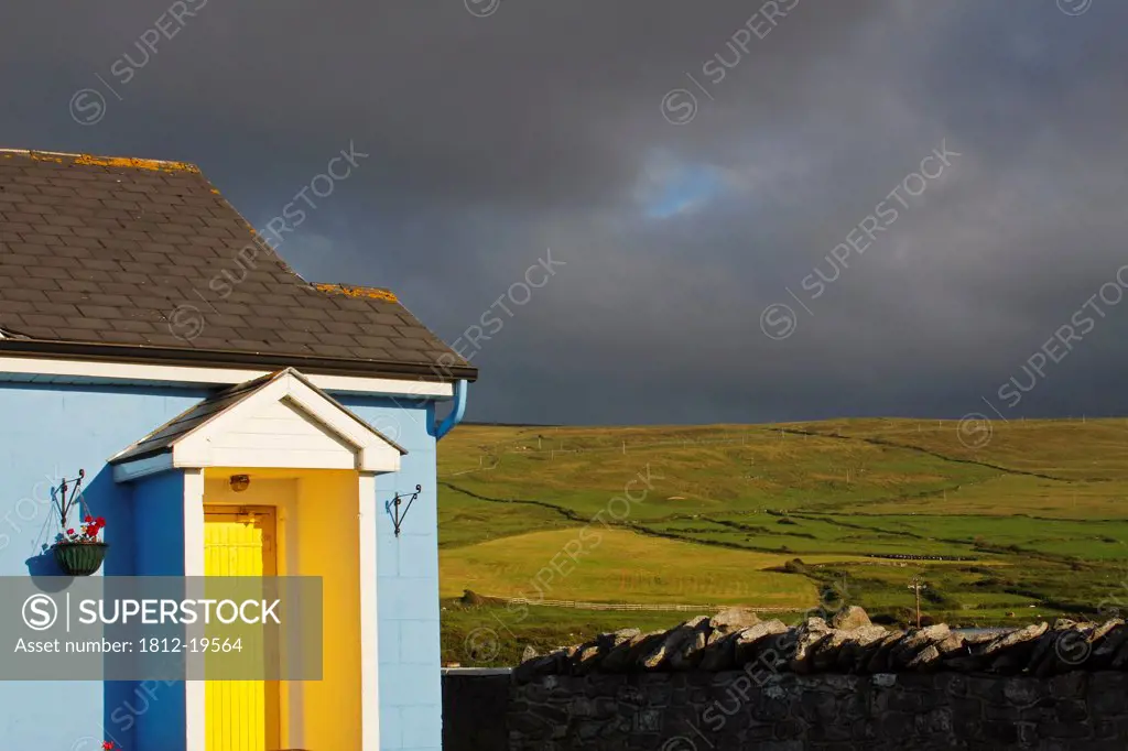 Blue Building With A Yellow Door In The Burren Region; Fanore County Clare Ireland