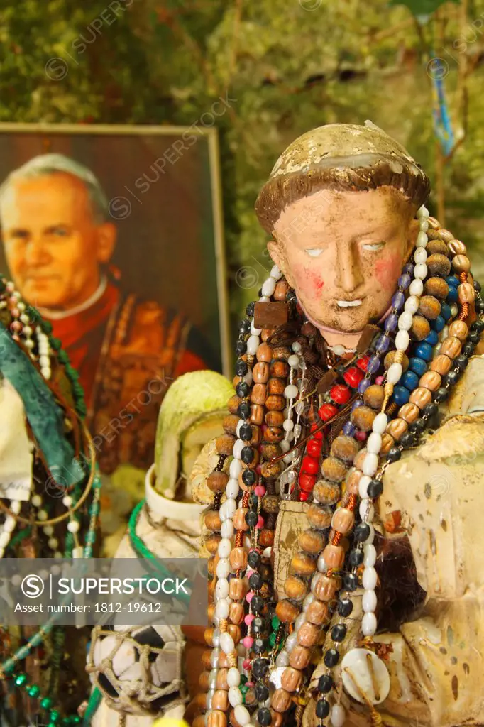 Statue And Rosary Beads Inside St. Brigid's Well; Liscannor County Clare Ireland