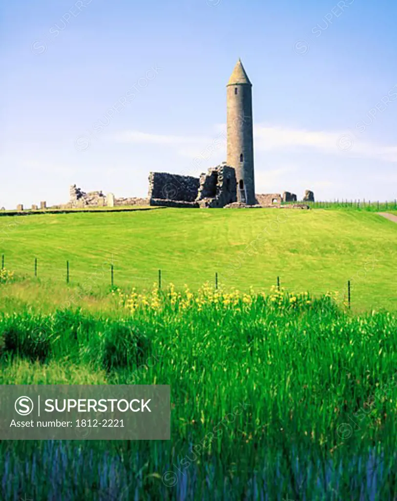 12th Century round tower and abbey, Lough Erne, Devenish Island, Co Fermanagh, Ireland