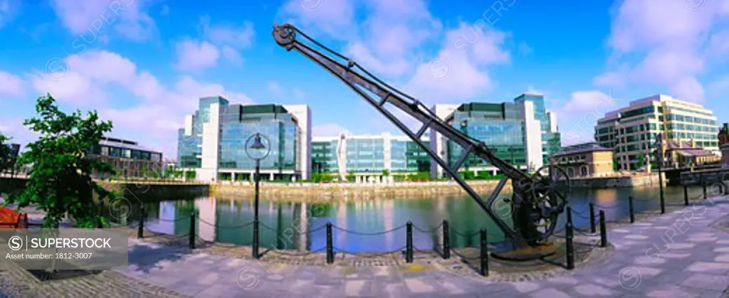 Crane on a riverbank, International Financial Services Centre, Dublin, Republic Of Ireland