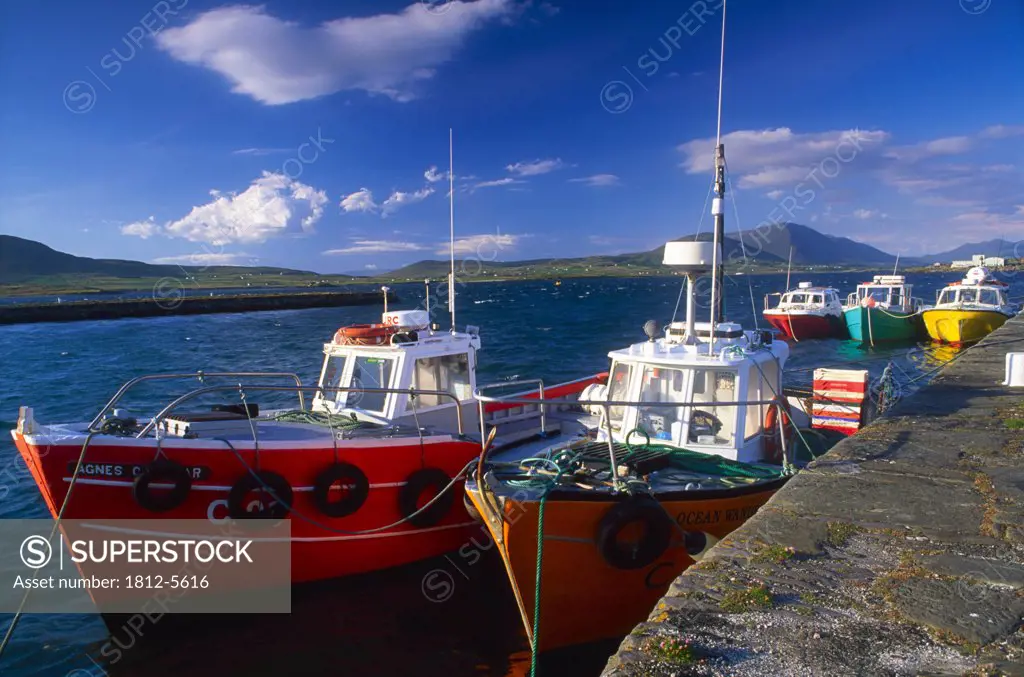 Knightstown Pier, Valentia Island, Ring of Kerry, County Kerry, Ireland; Boats docked at pier