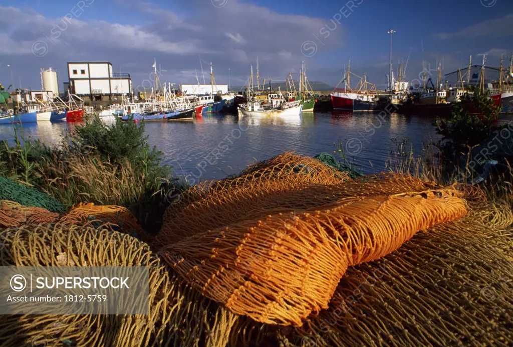Quayside, Greencastle, County Donegal, Ireland; Fishing nets and boats