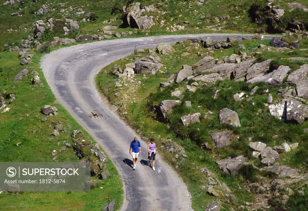 Gap of Dunloe, Killarney National Park, County Kerry, Ireland; Hikers on a trail