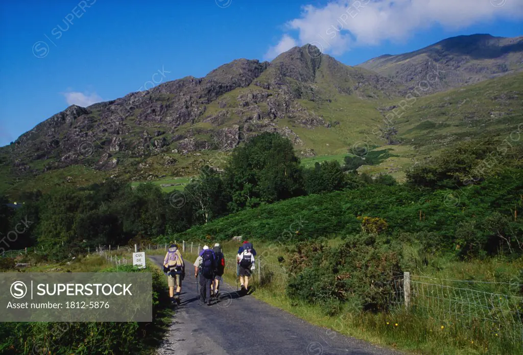 Black Valley, Killarney National Park, County Kerry, Ireland; Hikers walking on trail