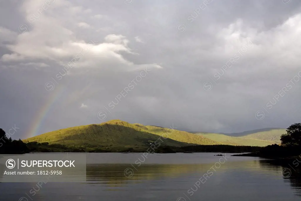 Cloonee Lakes, County Kerry, Ireland; Rainbow over lake  