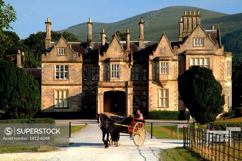 Muckross House, Killarney, County Kerry, Ireland; Horse and buggy in front of mansion