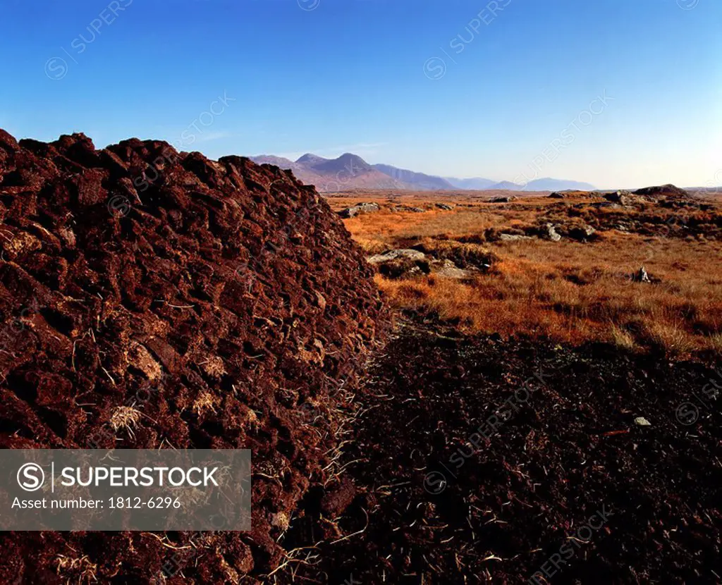 Stack of peat on a landscape, Roundstone Bog, Connemara, County Galway, Northern Ireland
