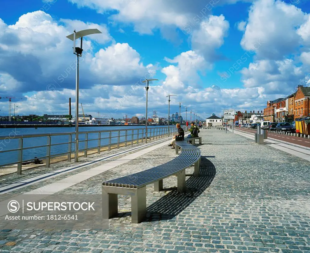 North Quays and River Liffey, Dublin, Co Dublin, Ireland, Cobblestone walkway along the river