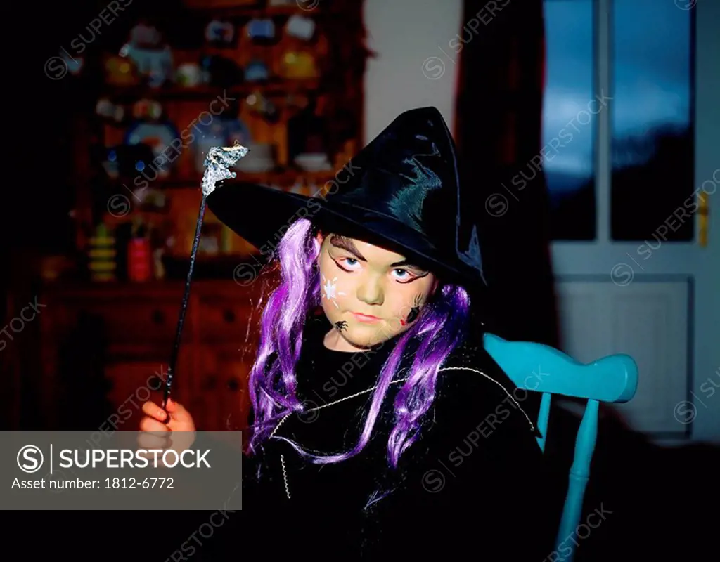 Child dressed as a witch