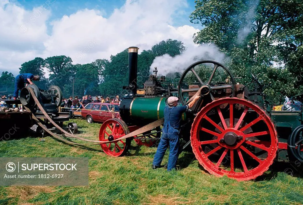 Stradbally, Co Laois, Ireland, Men working on a tractor on a traction engine rally