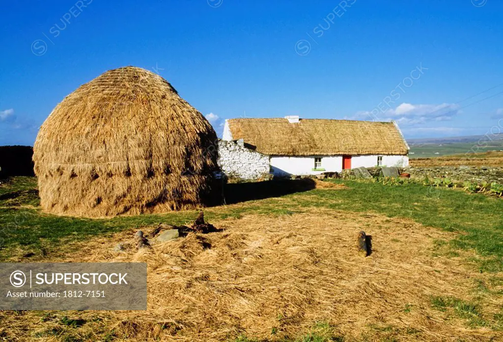 Near Doolin, Co Clare, Ireland, Traditional cottage and hay