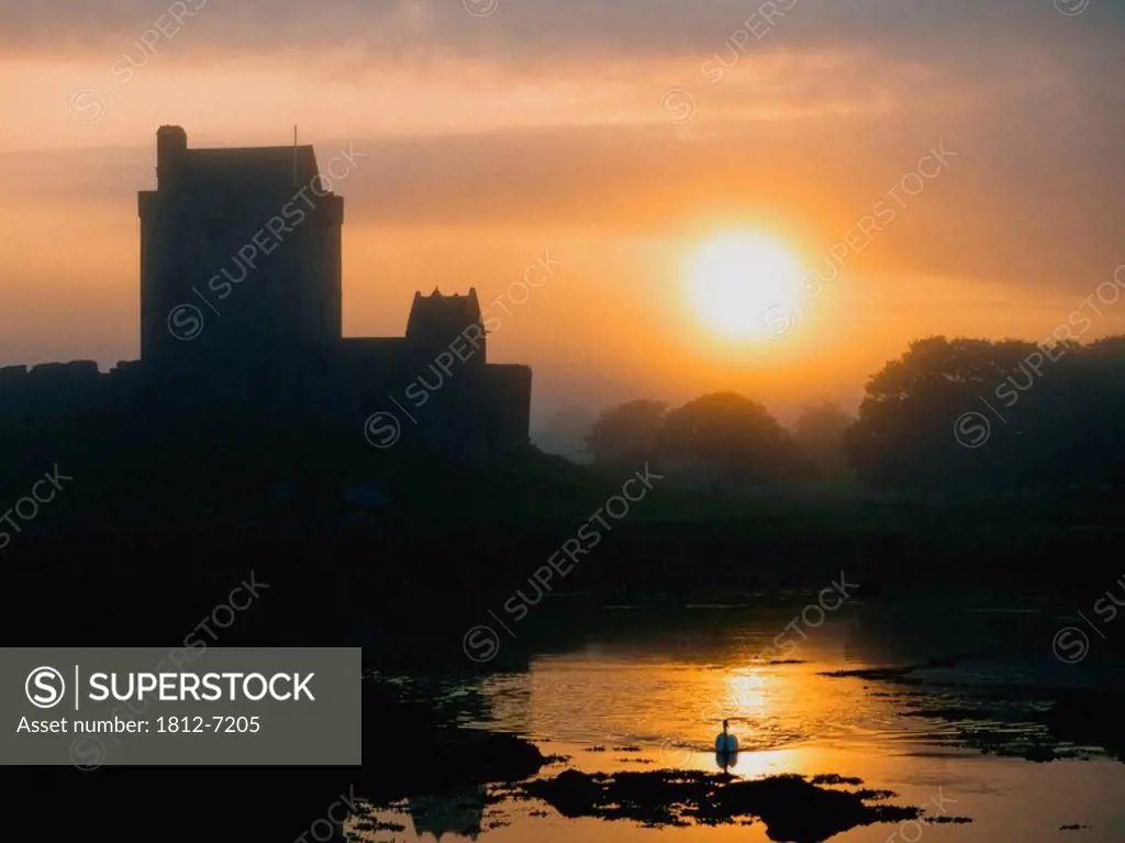Dunguaire Castle, Kinvara, Co Galway, Ireland, Silhouette of a 16th Century castle at sunset