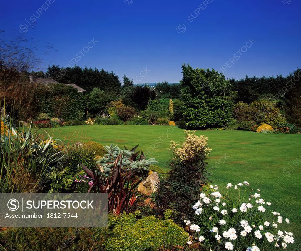 Lakemount Gardens, Co Cork, Ireland, Lawn and plants at a garden