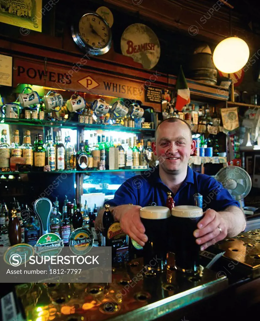 Dublin, Co Dublin, Ireland, Barman in traditional pub