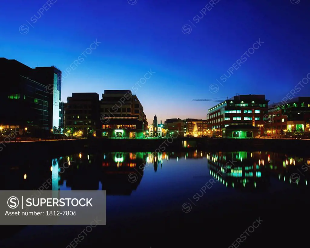 IFSC, Dublin, Ireland, Building lights reflected in river at night