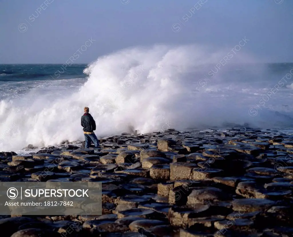 The Giant´s Causeway, Co Antrim, Ireland, Person standing on the coast of Ireland
