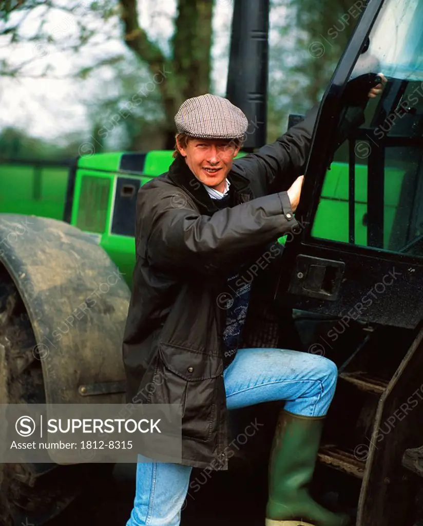 Farmer and tractor, Ireland