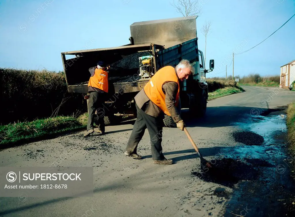 Co Kildare, Ireland, People mending a road