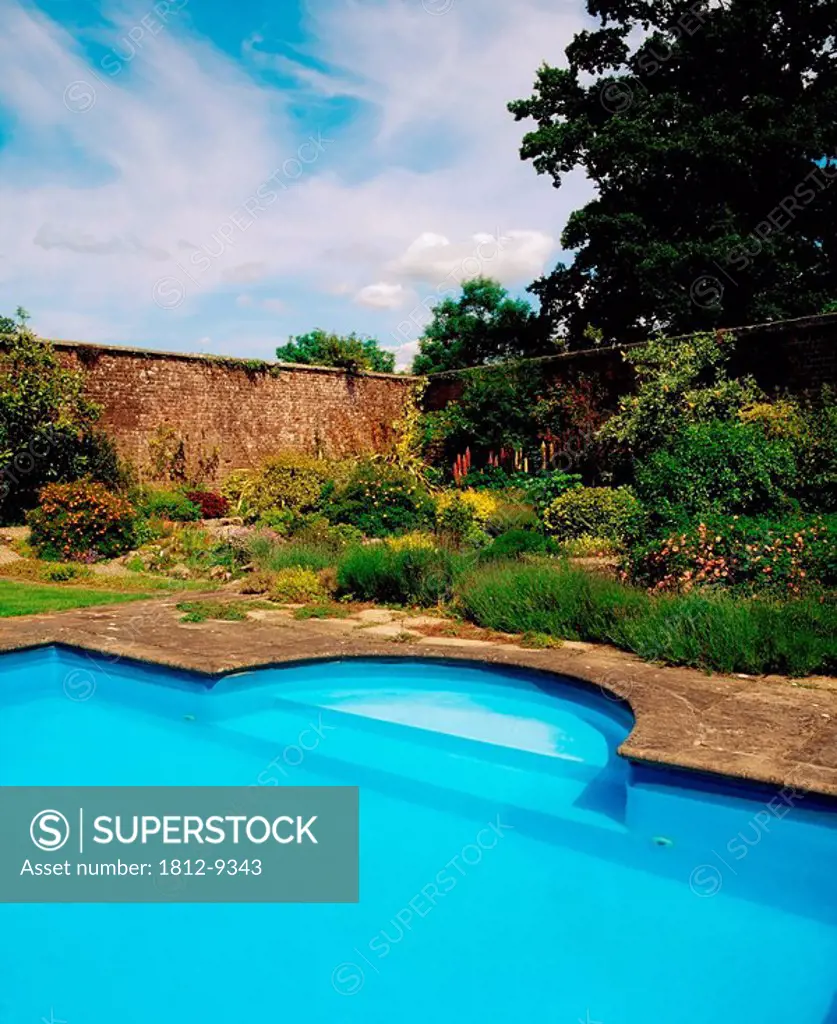 Lisnavagh House & Gardens, Co Carlow, Ireland, Swimming pool surrounded by a garden
