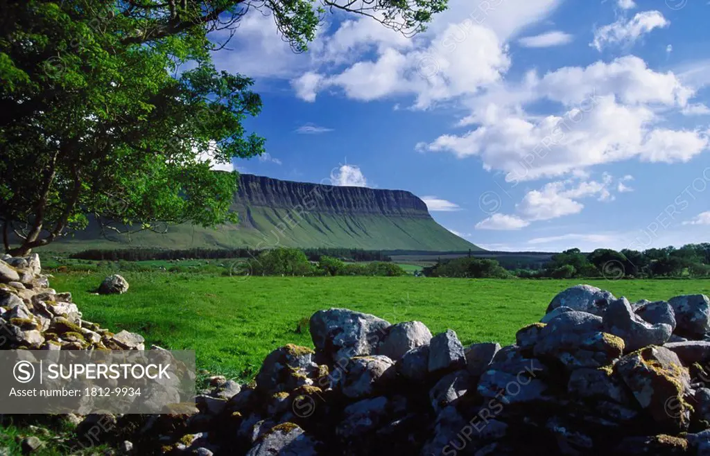 Stone wall in foreground of Benbulbin rock formation, County Sligo, Ireland