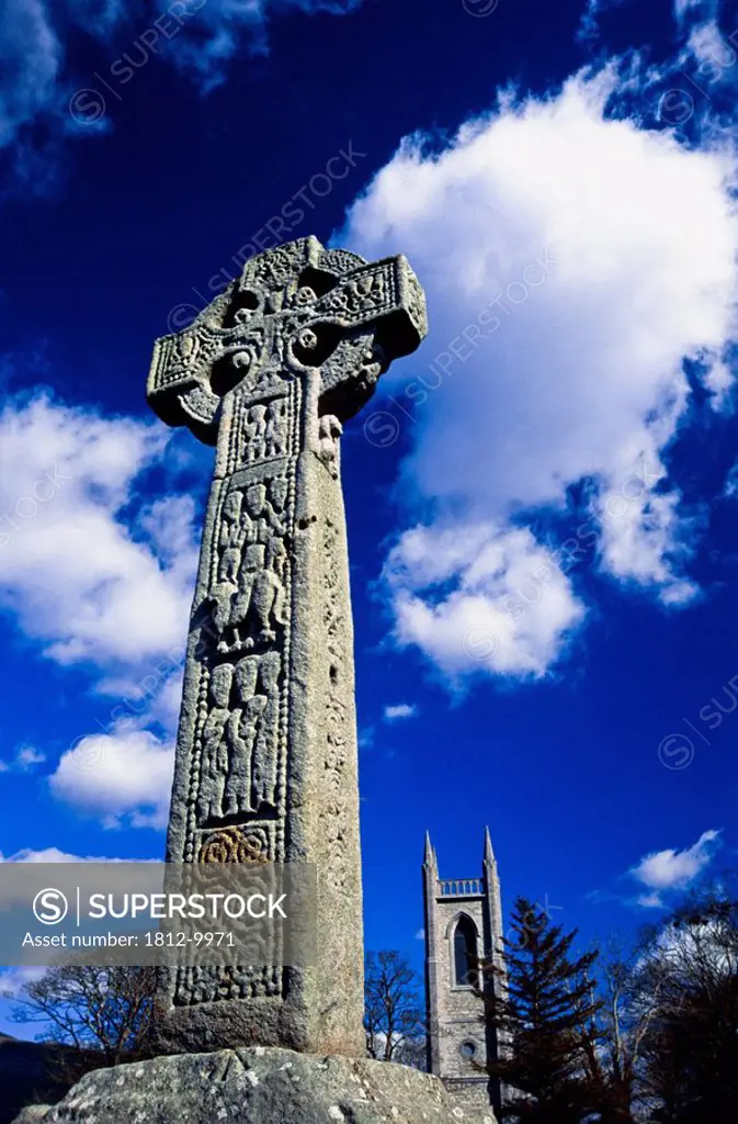 High cross with cathedral, Ireland