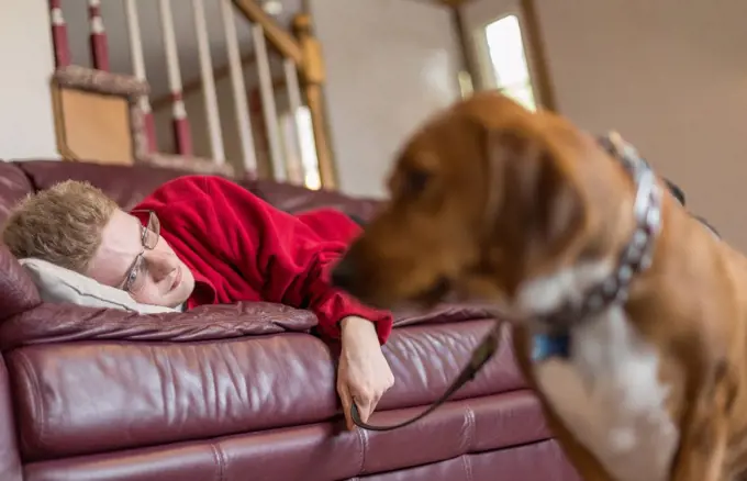 Boy with Anxiety Disorder and his therapy dog