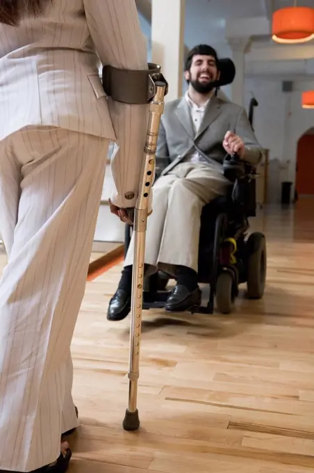 View of a handicapped man and woman in conversation