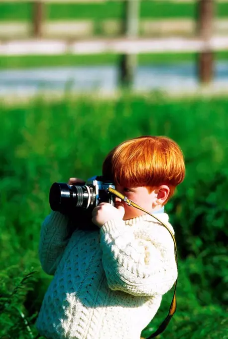 Ireland, Boy taking a picture