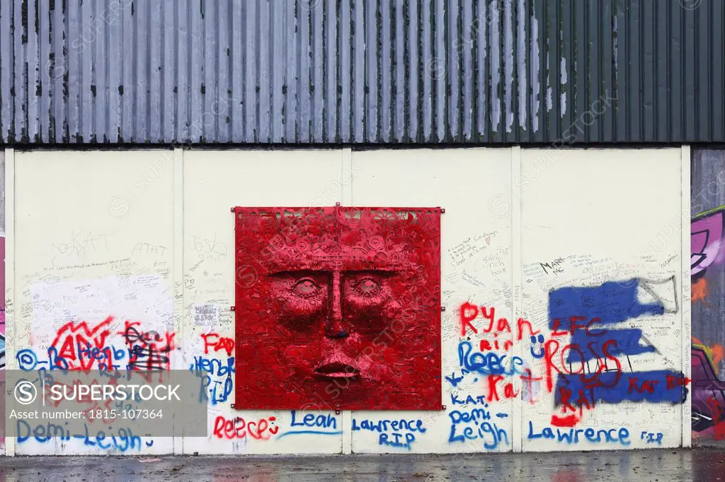 United Kingdom, Ireland, Northern Ireland, West Belfast, Wall murals and grafitti with human representation at Shankill road