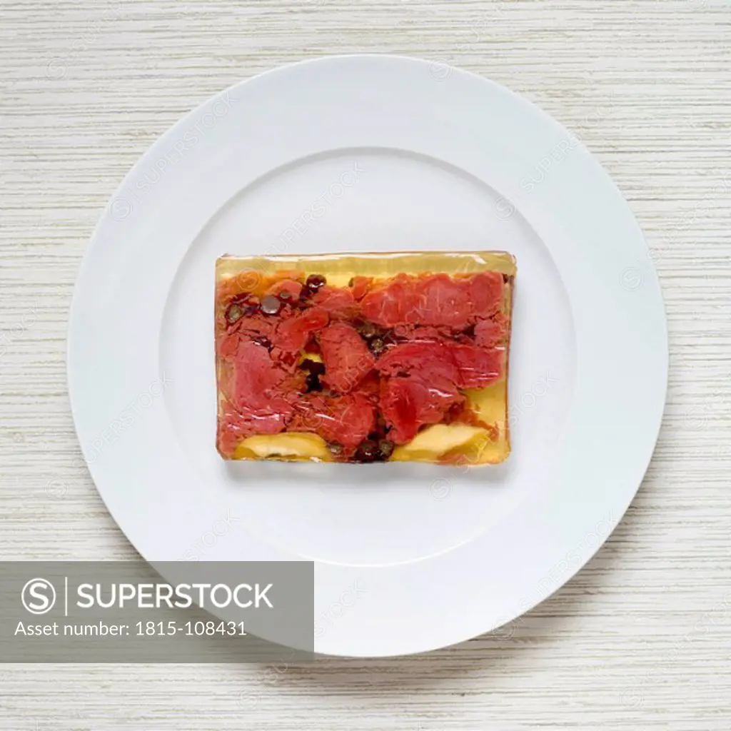 Soured meat in jelly on plate, elevated view
