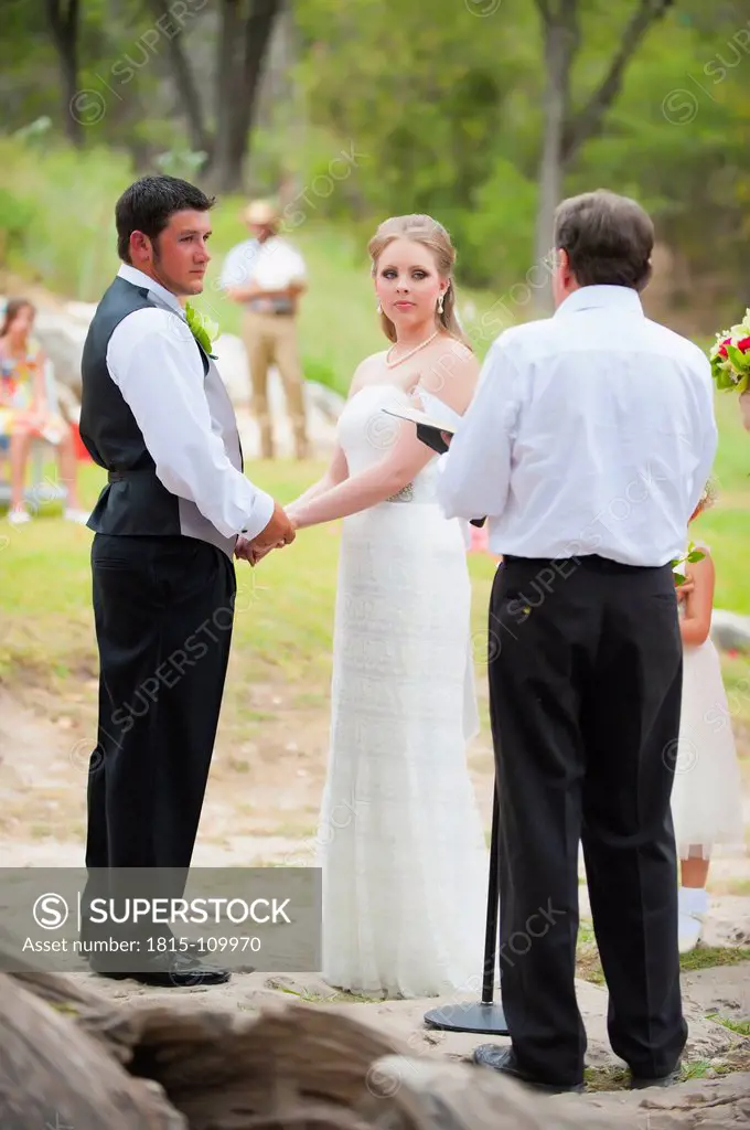 USA, Texas, Bride and groom getting married