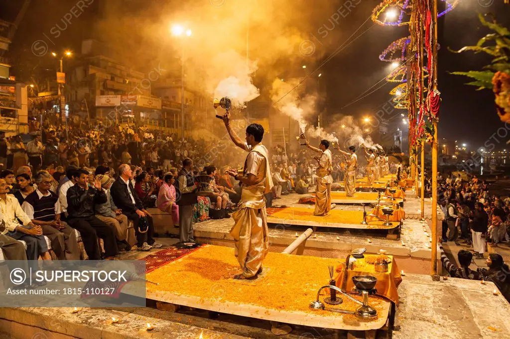 India, Uttar Pradesh, Priests celebrating River Ganges Aarti