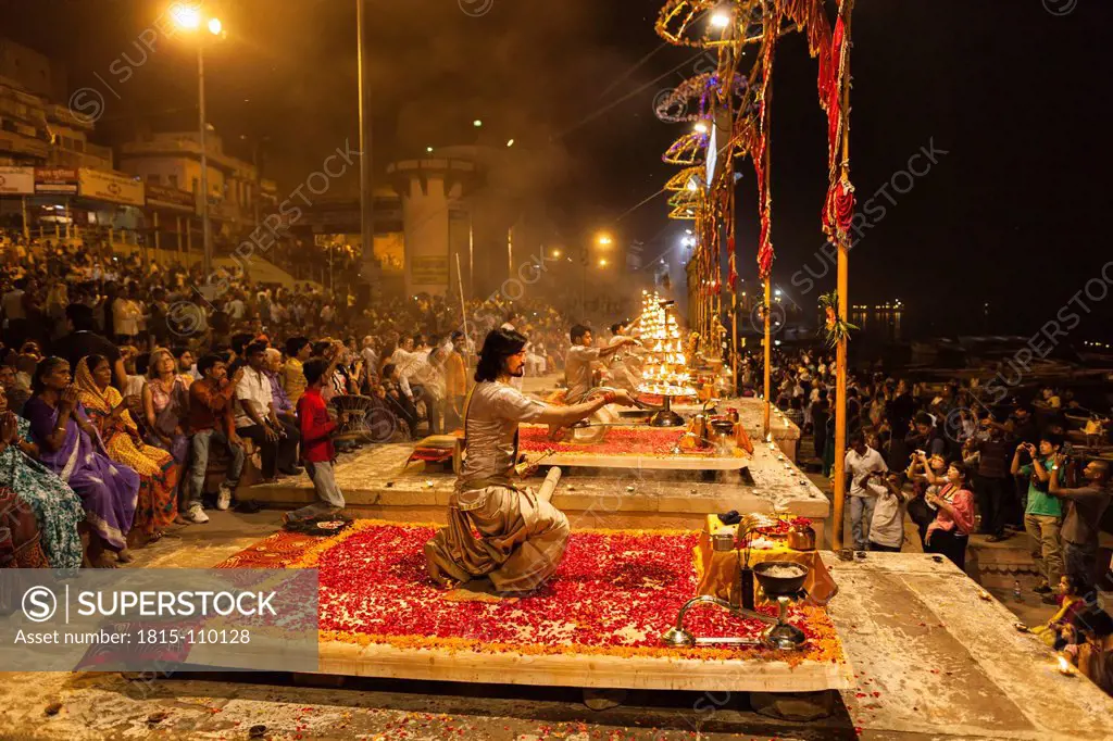 India, Uttar Pradesh, Priests celebrating River Ganges Aarti