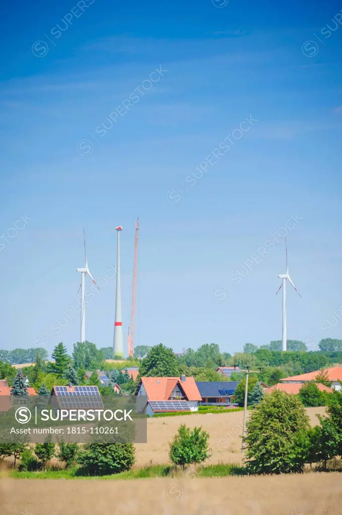 Germany, Saxony, View of wind turbine with solar panel in wind park