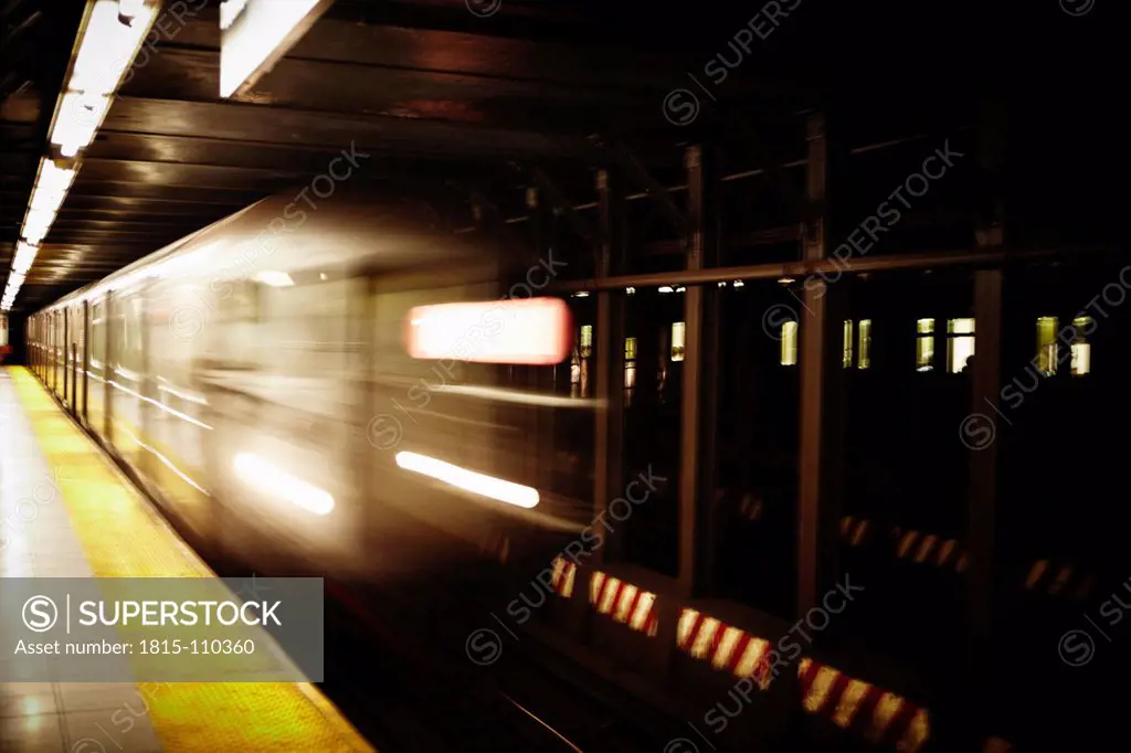 USA, New York, Train passing through subway station