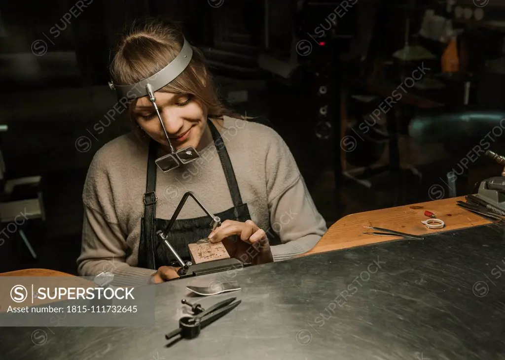 Artisan making jewellery in his workshop