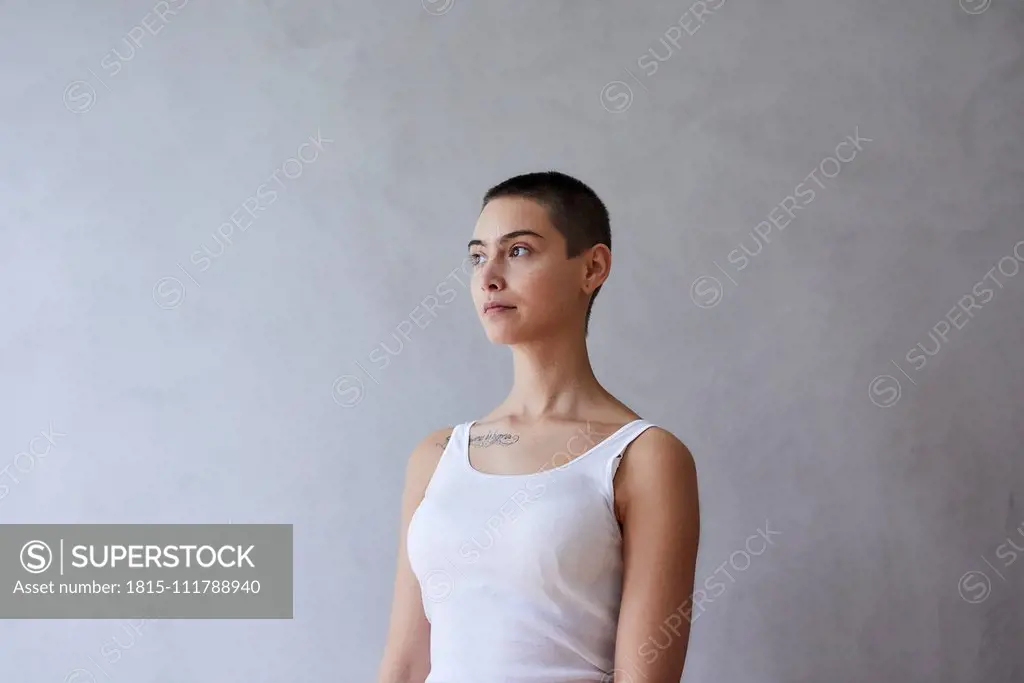 Portrait of short-haired young woman wearing vest