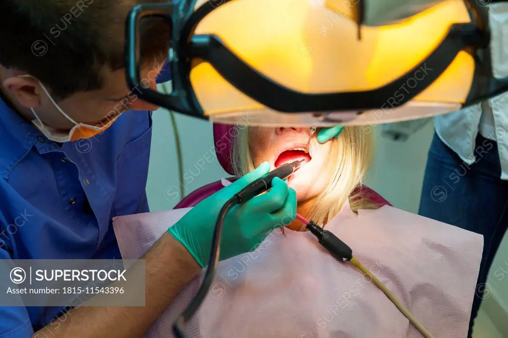 Woman receiving dental teatment