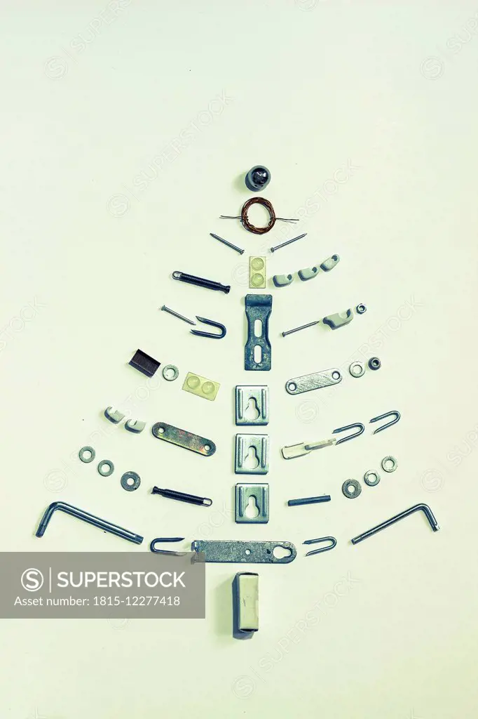 Christmas tree formed of hardware on light ground