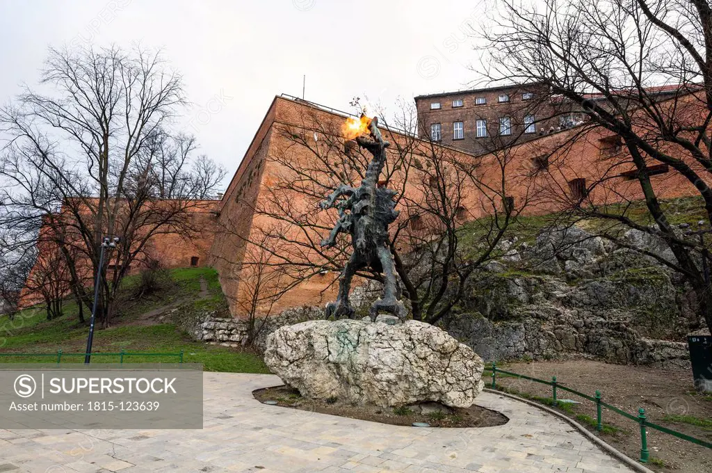 Poland, Krakow, Sculpture of dragon spitting flames
