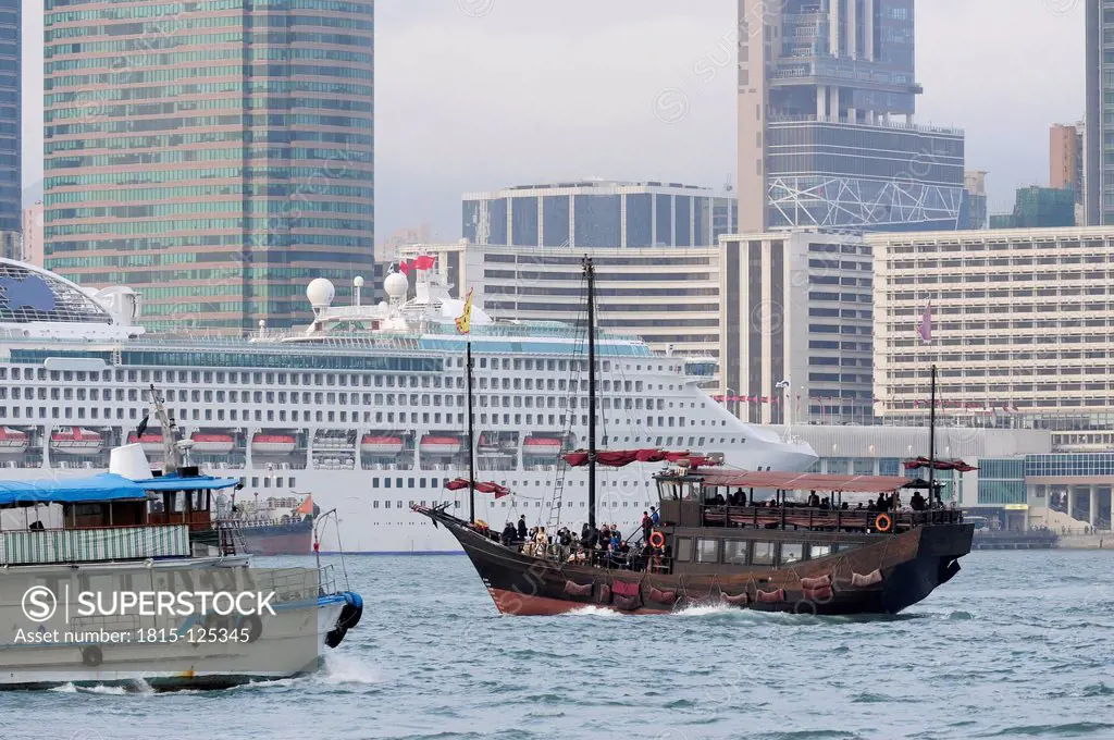 China, Hong Kong, View towards boats in bay of Victoria Harbour and Tsim Sha Tsui