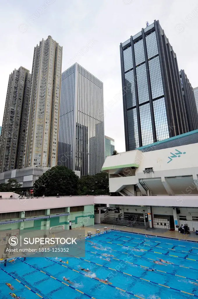 China, Hong Kong, High-rise buildings behind swimming pool in Wan Chai
