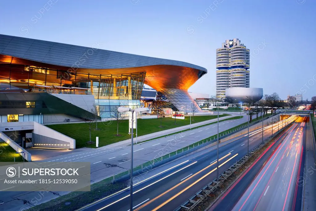 Germany, Bavaria, Munich, BMW World and BMW Tower at blue hour