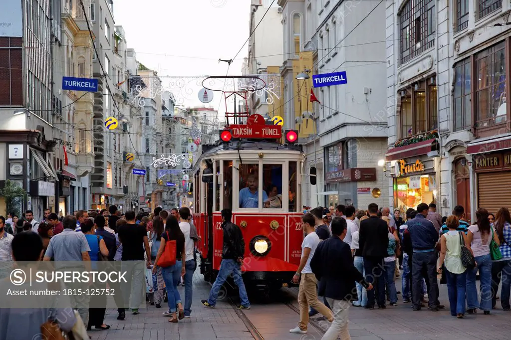 Turkey, Istanbul, People and historical tram on Istiklal Caddesi road